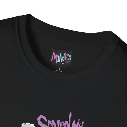 Close-up of a black t-shirt ribbed collar featuring a colorful label with "Mindkin & Co." in pastel colors inside a cat silhouette. Displays a playful, retro design.