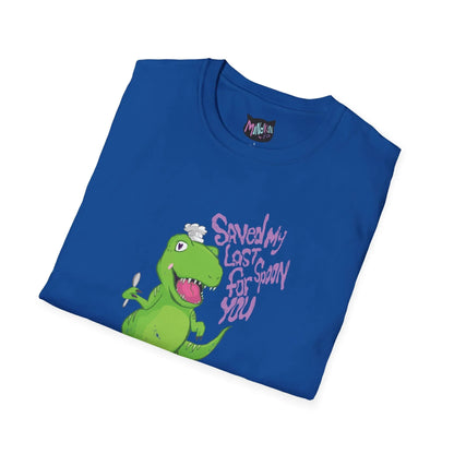 Folded royal blue t-shirt with a cartoon green dinosaur holding a spoon and wearing a chef hat. Purple text reads "Saved my last spoon for you." Playful tone.