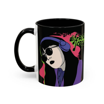 A sleek glossy black mug featuring an illustration of a girl with long dark hair, wearing sunglasses and headphones, neon green text says "different frequency" beside her. The style is grunge and retro.