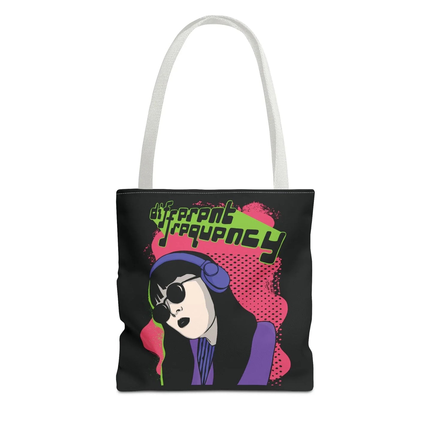 Illustrated white-strapped tote with a stylish person wearing headphones and sunglasses on a pink background. Text reads "different frequency." Retro vibe.
