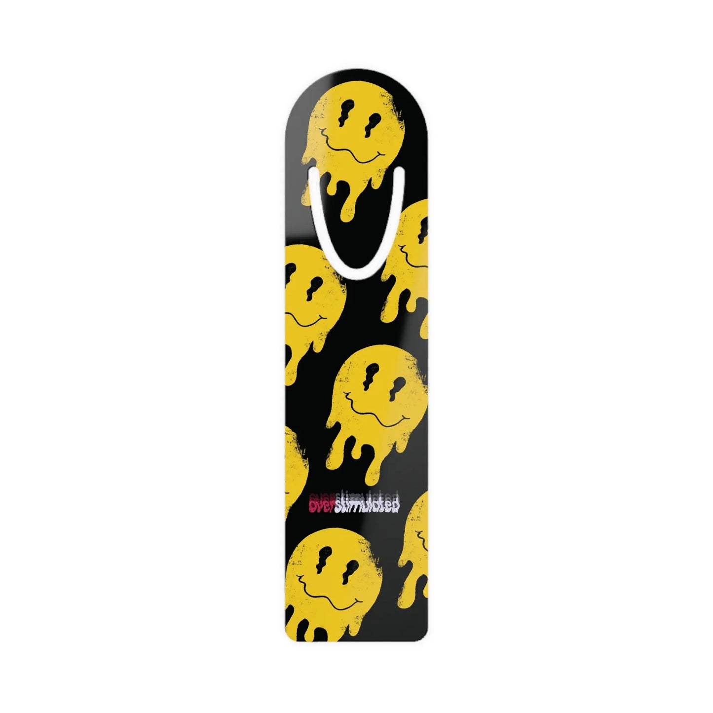 Black bookmark with repeating yellow melting smiley faces. The word “overstimulated” is printed in faded red and white near the bottom. Vibrant and edgy design.