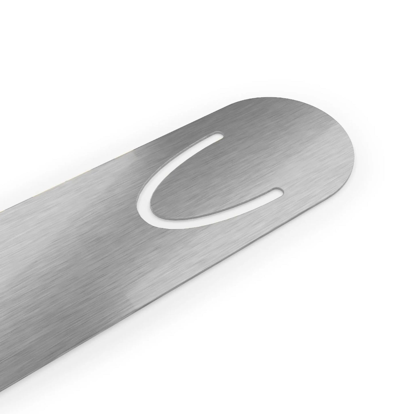 Close-up of a brushed metal bookmark with a rounded end, featuring a cut-out groove for pages. The product is modern and sleek.