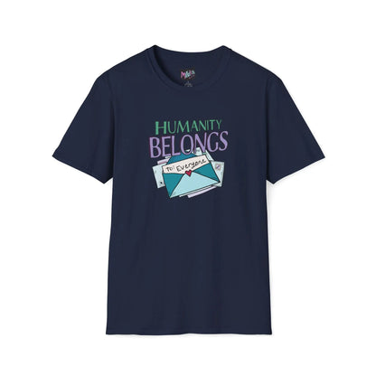 Navy T-shirt featuring "Humanity" in green letters above "Belongs" in purple lettering. An illustrated envelope with "To: Everyone" and a heart seal are below, promoting inclusivity.