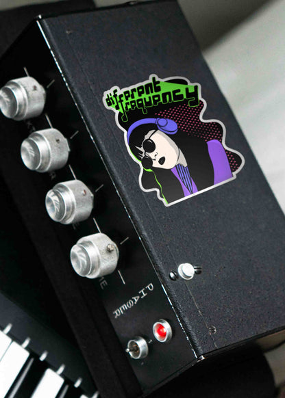 Glossy, scratch-resistant Different Frequency sticker seen on a music equipment item.