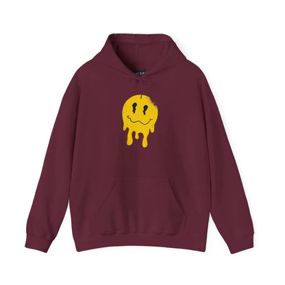 Front view of maroon “Overstimulated” hoodie by Mindkin & Co. featuring hand-drawn dripping yellow smiley graphic