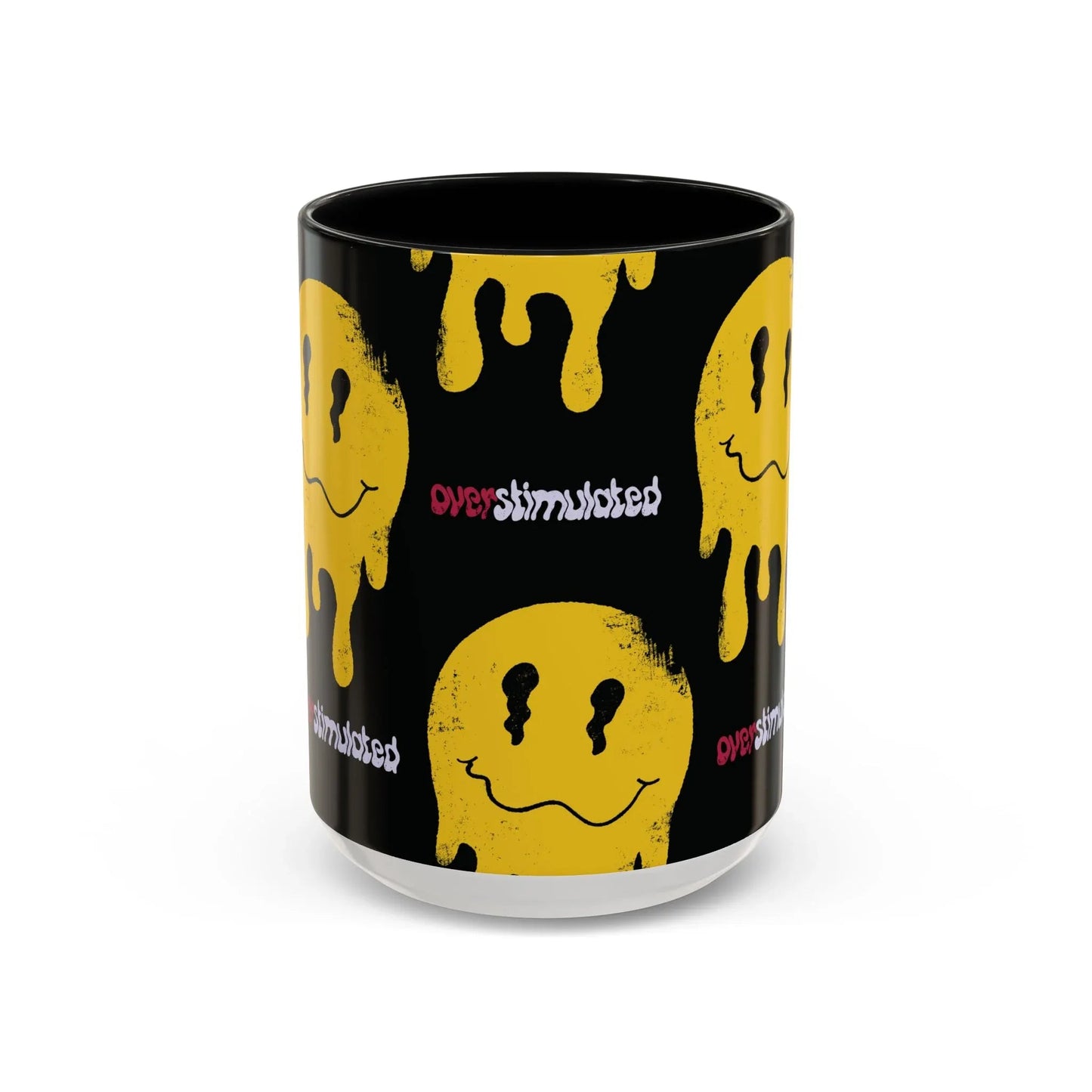 Side of black 15oz mug featuring yellow melting smiley faces and the word "overstimulated" in mixed red and white text. The design conveys a sense of playful chaos.
