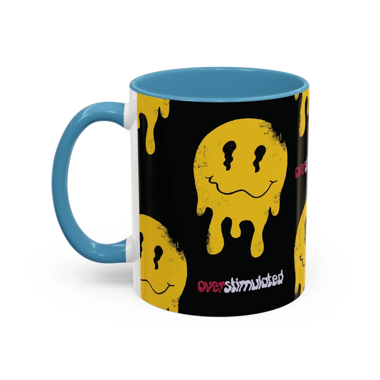 Black mug with a yellow melting smiley face pattern, evoking a playful, edgy vibe. The word "overstimulated" appears in red and white text, with glossy baby blue handle and interior.